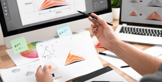 Mobile-app-development-company-services-branding A mobile app development company expert working on custom branding visuals
