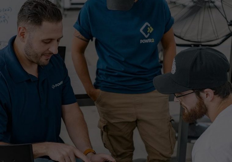 custom-website-design-company-Powr2 powr background image with three employees